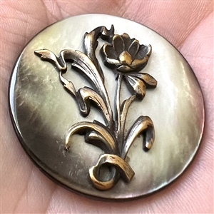 Art Nouveau pearl button with flower.