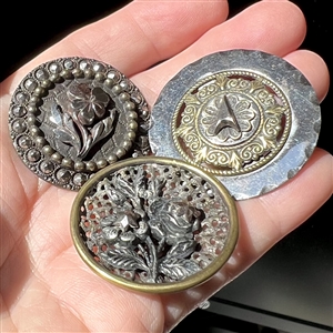 Three 19th c. Plant life buttons with steels.
