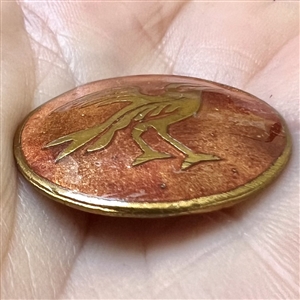 French couture enamel button of a bird by Cole. 
