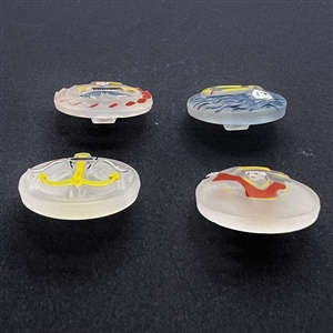 Set of four frosted clear glass buttons of nautical themes.