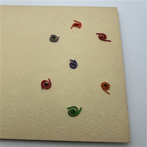Card of seven glass buttons - “Lady Isabella” with information.