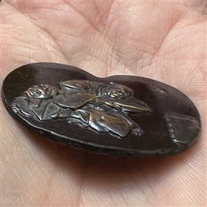 Japanese Shakudo button of robed figure.