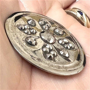 An 18th c. Steel button with concave design elements and cut steel.