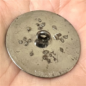 An 18th c. Steel button with concave design elements and cut steel.