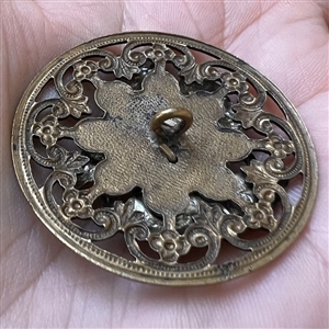 Brass button of “Henry of Navarre.”