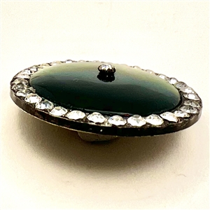 A 19th c. Green glass in silver button with pastes.