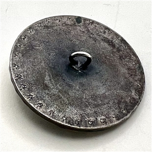 A 19th c. Green glass in silver button with pastes.