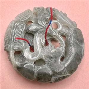 Thick jade trim of fish, water and plant life.