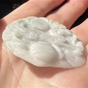 Jade trim of fabulous creature.