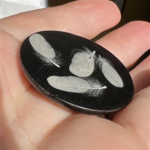 Late 18th c. painted lacquer button of four feathers.