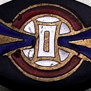 Composition button with enamel design.