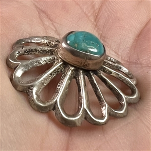 Native American button of cast silver with turquoise center