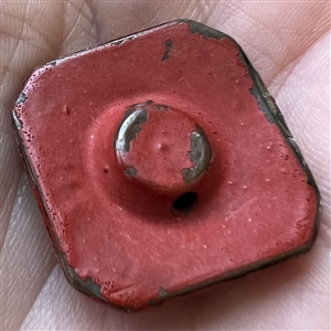 Chinese Cinnabar button of an Asian man.