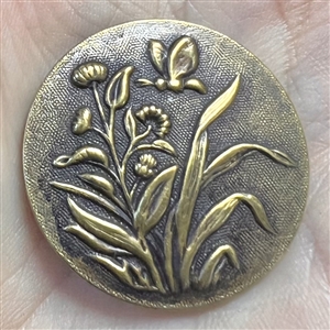 French tight button of plants with butterfly.
