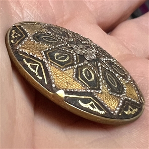 Damascene button of patterns.