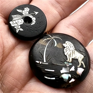 Two inlay buttons.