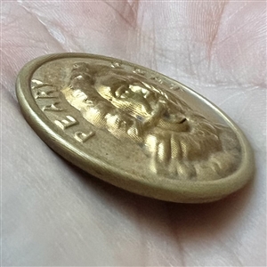 Commemorative brass button of “Peary Coat.”