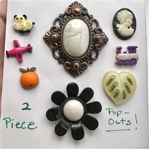 Card of fourteen snap-together buttons.
