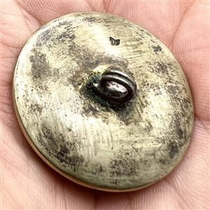 Cloisonné enamel button of flowers.