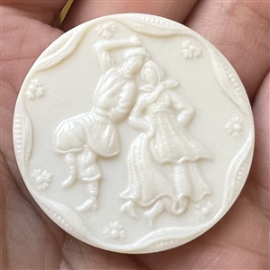 Artid Vintage plastic button of man and woman dancing.