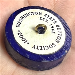 Movable show favor button of “Little Miss Muffet by Grace Bauman.