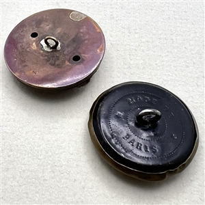 Two French brass sporting buttons of men hunting with dogs.