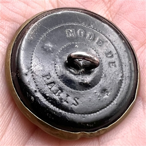 Two French brass sporting buttons of men hunting with dogs.