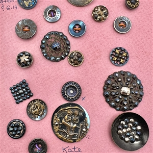 Card of thirty four blued steel buttons.