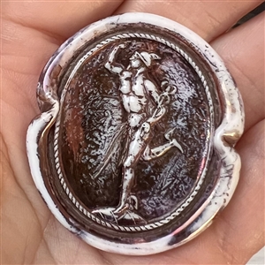 Bimini-type glass button of Mercury.