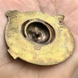 Brass button of realistic artist's pallet.