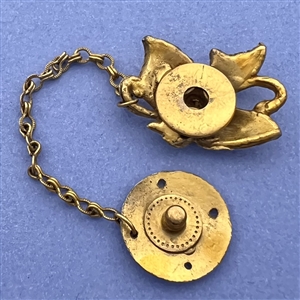 Vintage snapette of metal bird.