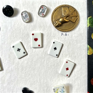 Card of twenty four playing card theme buttons.