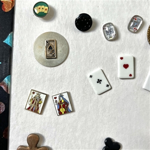 Card of twenty four playing card theme buttons.