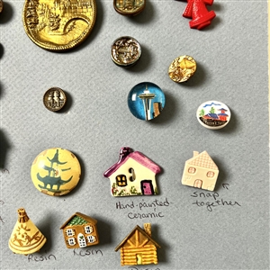 Card of thirty two architectural buttons. 