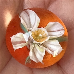 Stunning show favor button by Mary Gaumond - glass paperweight studio button of a 3D orange blossom.