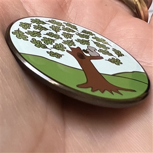 Show favor button from Iowa State Button Society of squirrel in a tree.