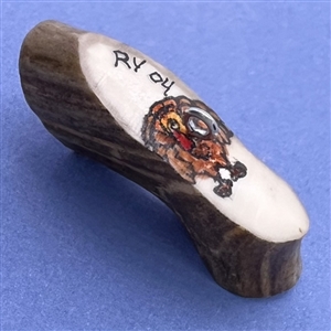 Studio button on antler with pilgrims.