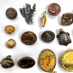Twenty one assorted fun buttons.