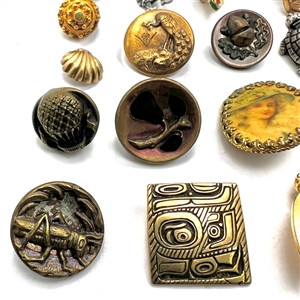 Twenty one assorted fun buttons.