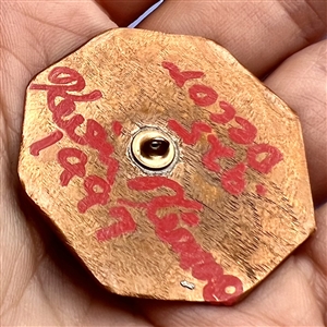 Studio button of a snowman by Kevin Kinne.