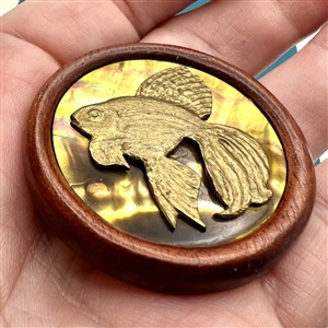 Studio button of a fish by Herman Bangman (?)