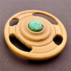 Studio button with turquoise center by Bob Benson. 