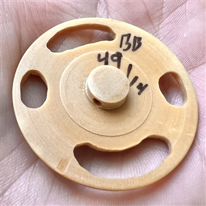 Studio button with turquoise center by Bob Benson. 