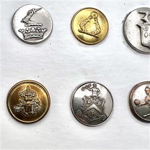 Fifteen Livery buttons depicting people and hands.