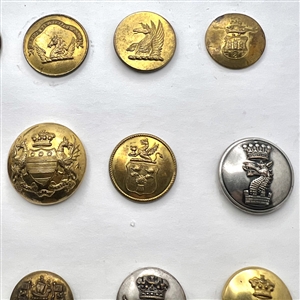 Fifteen Livery buttons depicting fabulous creatures.