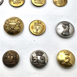 Fifteen Livery buttons depicting fabulous creatures.