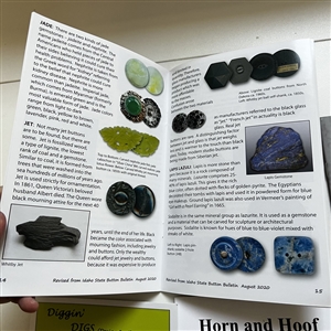 Seven button reference booklets.