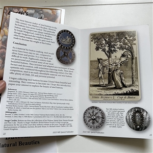 Seven button reference booklets.