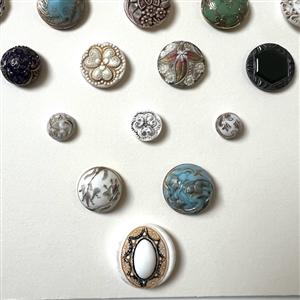 Card of 34 assorted Victorian glass buttons.
