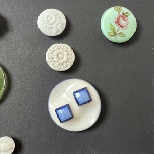 Card of 39 Uranium glass buttons.